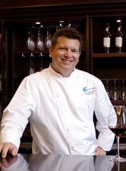 Highlands Ranch Executive Chef Greg Strickland stands at the bar.